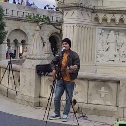Fun Zhi Busks in Budapest and 14 Other Countries